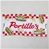 Portillo's beach towel with hot dog graphics and red checkered picnic pattern.