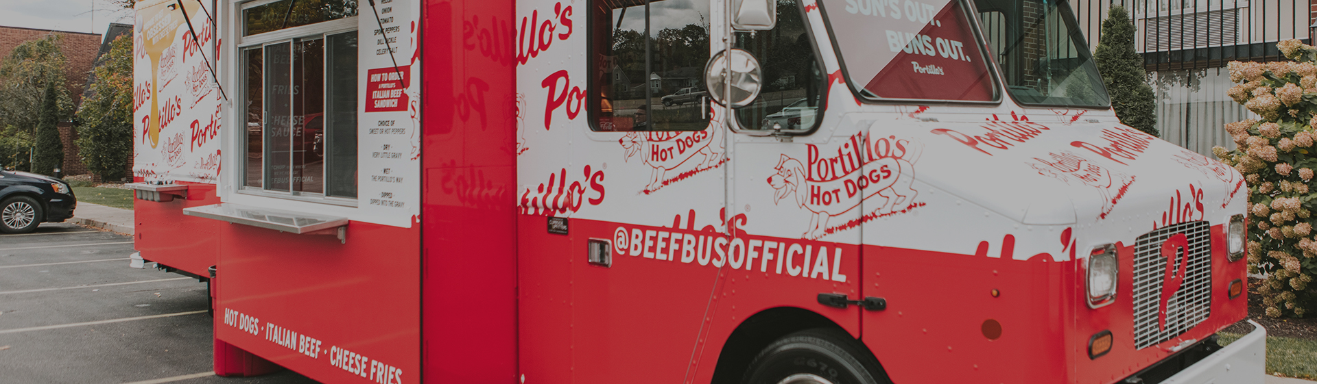 Side view of the Portillo's Beef bus food truck