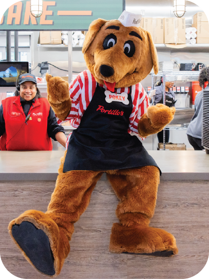Pokey mascot sitting at the expo counter of a Portillo's restaurant