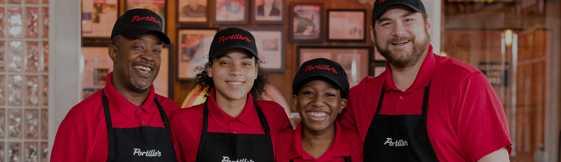 two smiling Portillo's employees