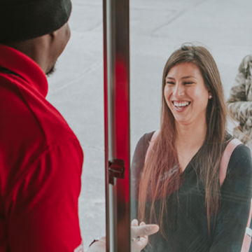 customer laughing outside beef bus food truck